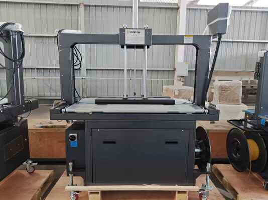جودة  Semi-Automatic 1200mm Carton Box Strapping Machine with One Year Warranty for Efficient Packing مصنع